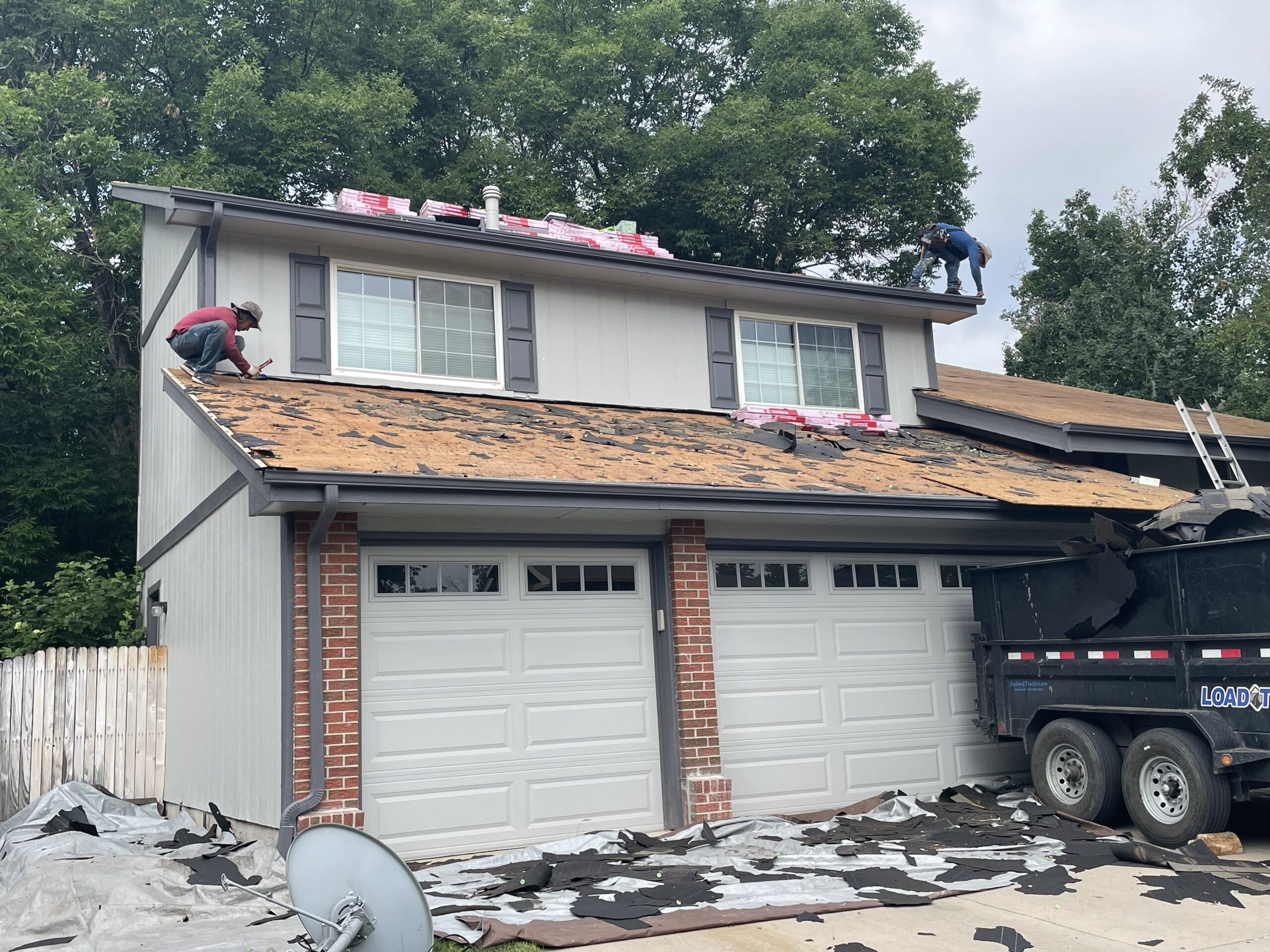 Road Home Exteriors crew installing a new roof on a home in Highlands Ranch, Colorado