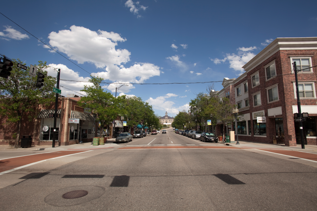 Streetscape of downtown Littleton, Colorado with historic buildings and storefronts