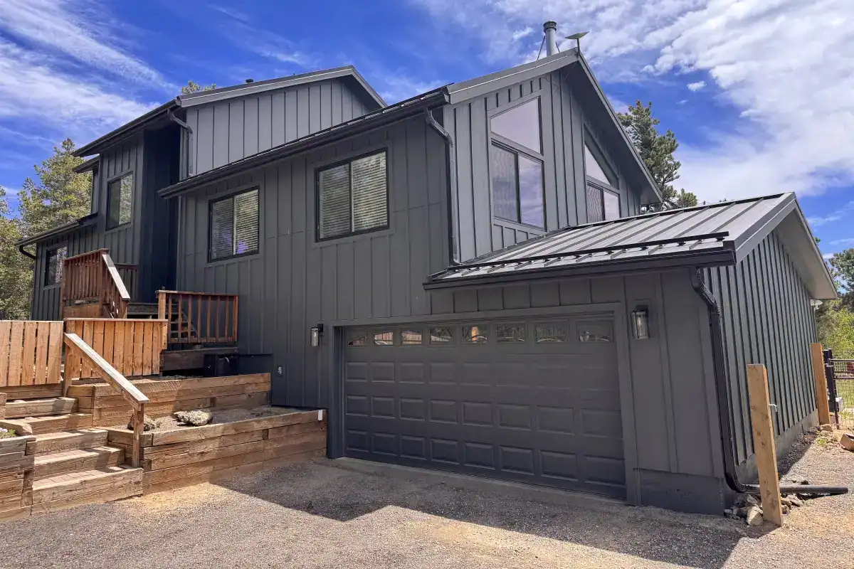 Standing seam metal roof professionally installed by Road Home Exteriors on a home in Nederland, Colorado.